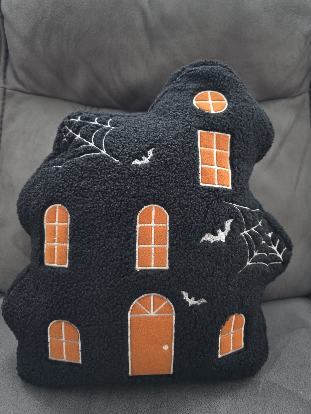 Kirkland Signature Black Haunted House Pillow with Orange Window Accents